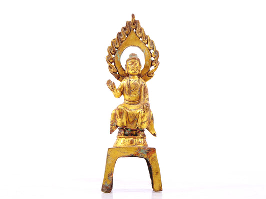 A sacred gilt bronze statue of Gautama Buddha