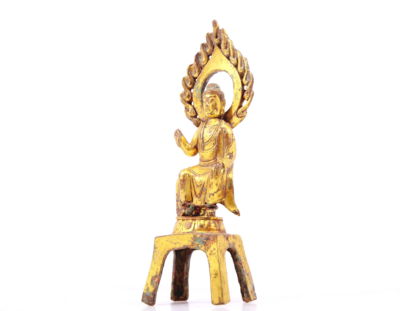 A sacred gilt bronze statue of Gautama Buddha