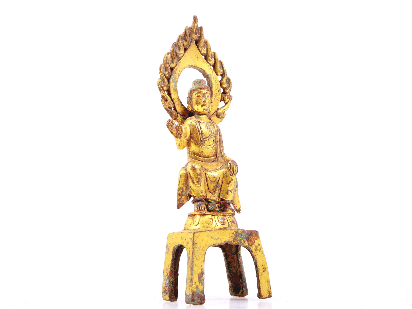 A sacred gilt bronze statue of Gautama Buddha