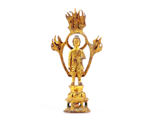 A sacred gilt bronze statue of Gautama BuddhaA sacred gilt bronze statue of Gautama Buddha