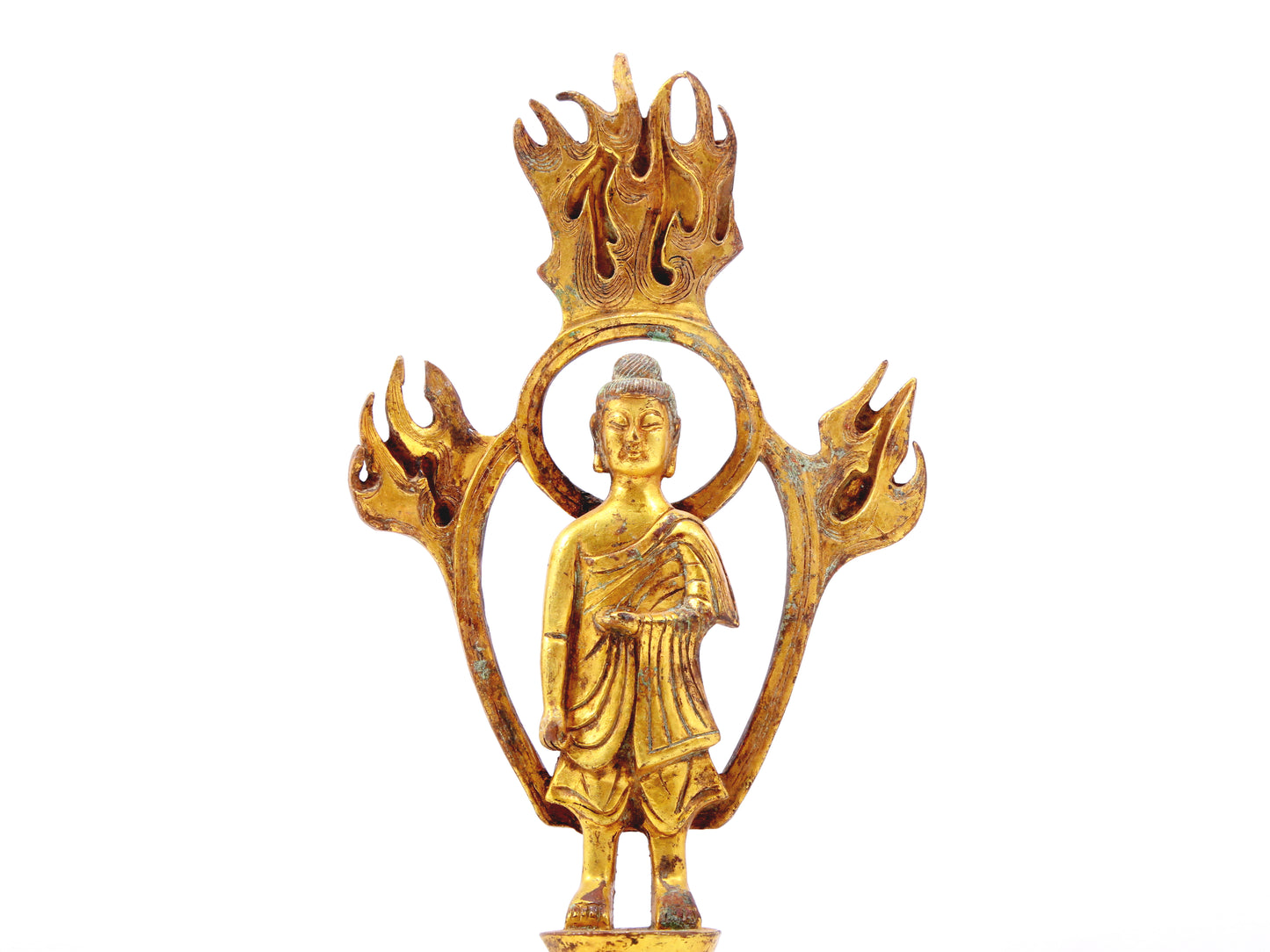 A sacred gilt bronze statue of Gautama BuddhaA sacred gilt bronze statue of Gautama Buddha