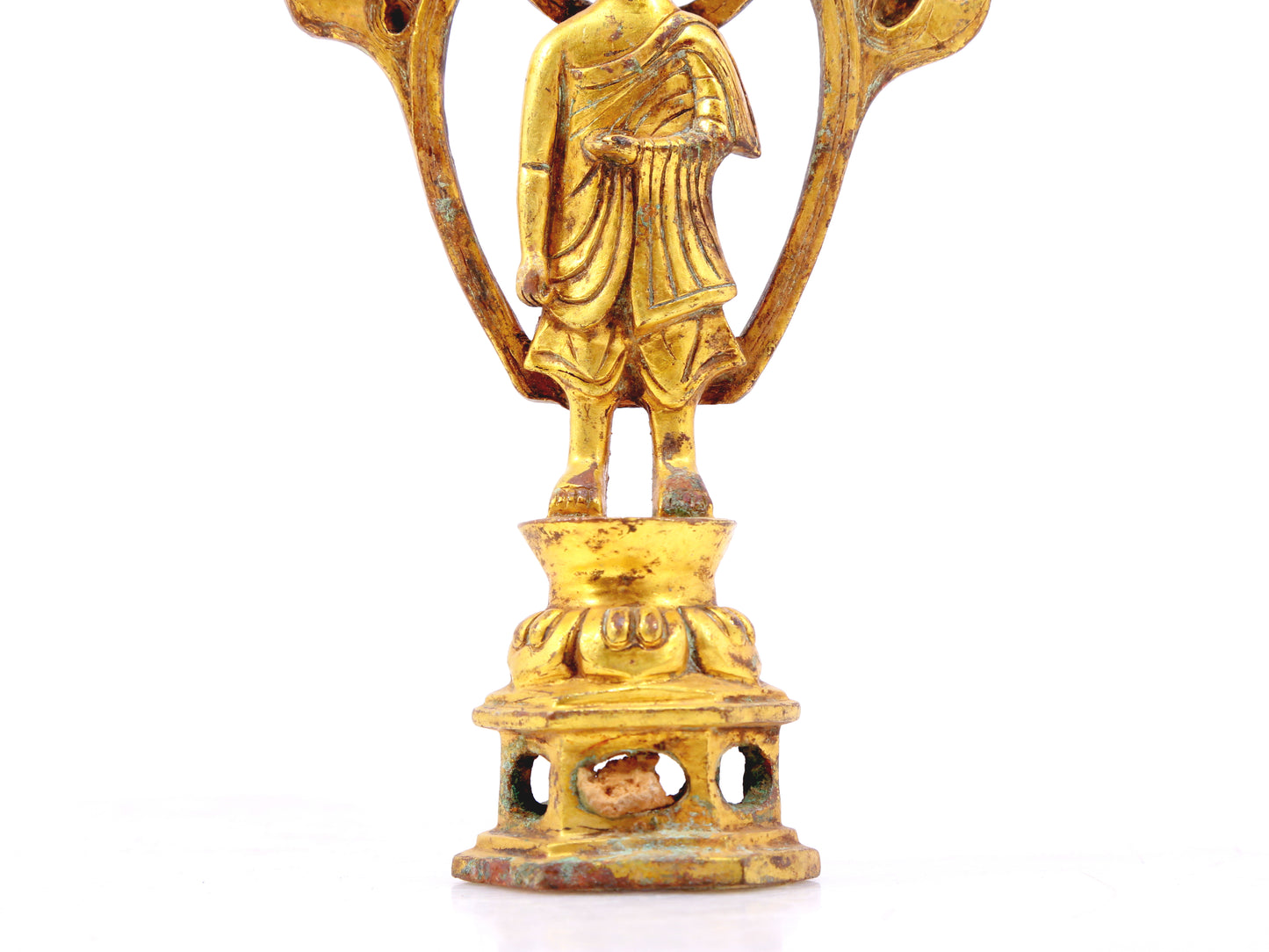 A sacred gilt bronze statue of Gautama BuddhaA sacred gilt bronze statue of Gautama Buddha