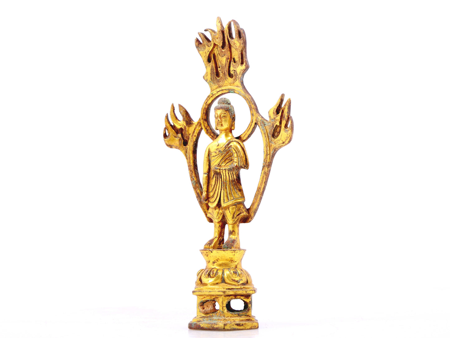 A sacred gilt bronze statue of Gautama BuddhaA sacred gilt bronze statue of Gautama Buddha