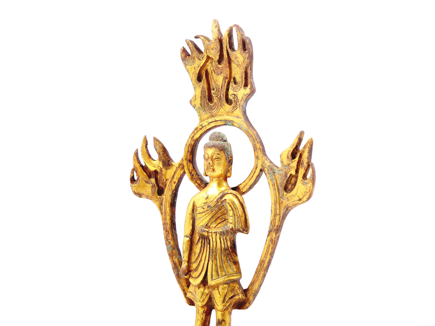 A sacred gilt bronze statue of Gautama BuddhaA sacred gilt bronze statue of Gautama Buddha