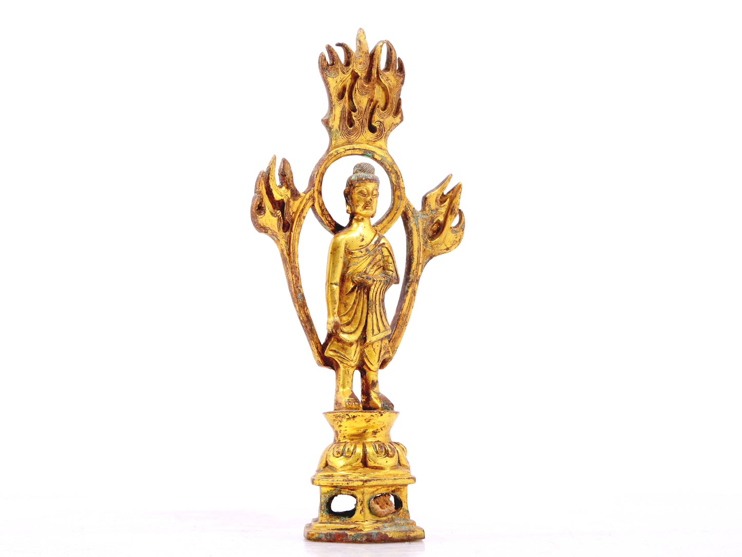 A sacred gilt bronze statue of Gautama BuddhaA sacred gilt bronze statue of Gautama Buddha