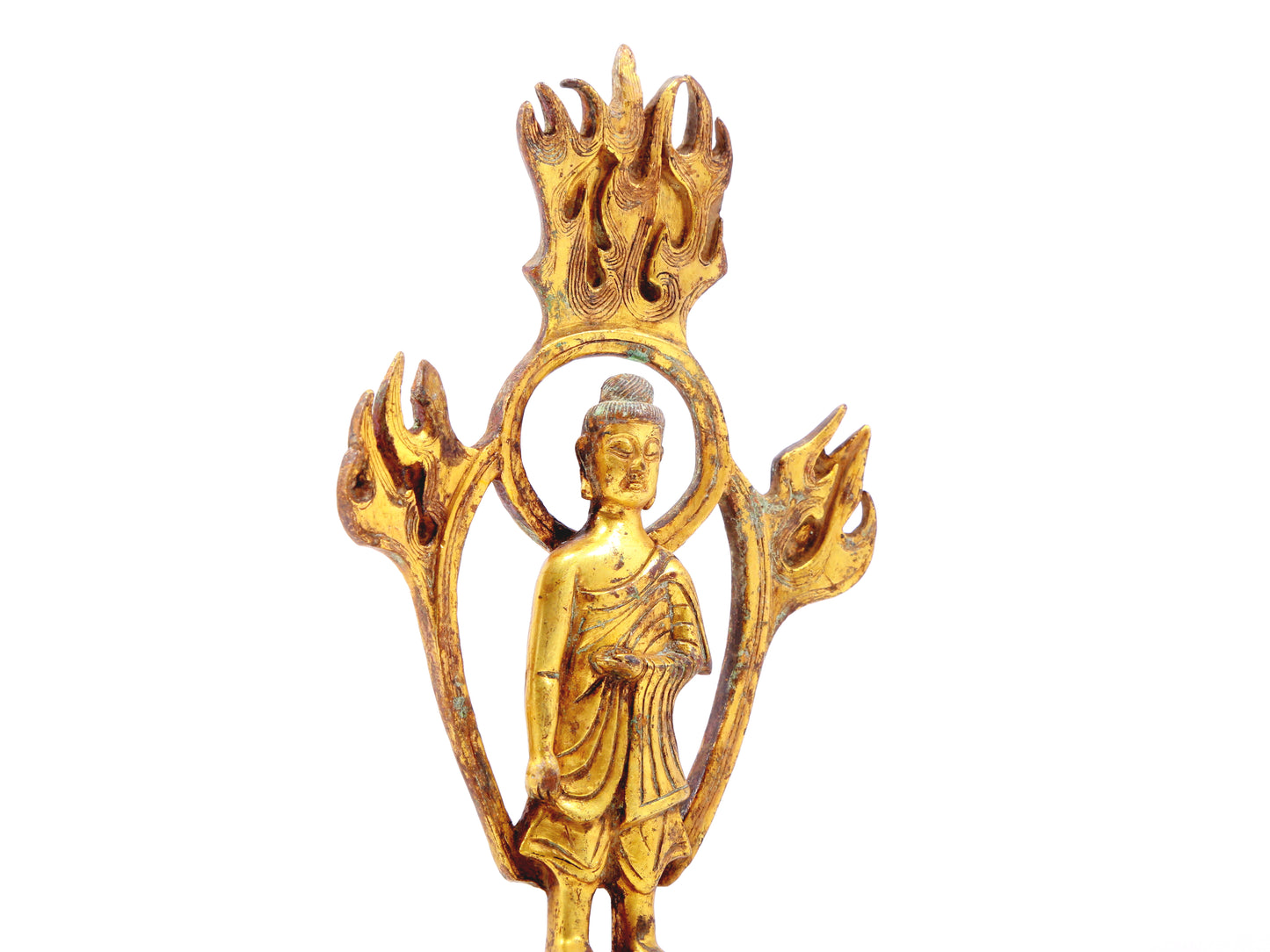 A sacred gilt bronze statue of Gautama BuddhaA sacred gilt bronze statue of Gautama Buddha