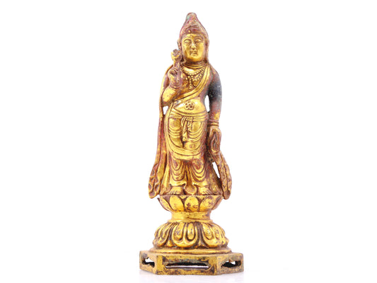 A sacred gilt bronze statue of Gautama Buddha