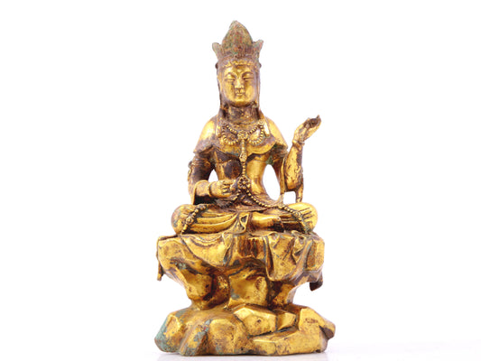 A sacred gilt bronze statue of Gautama Buddha