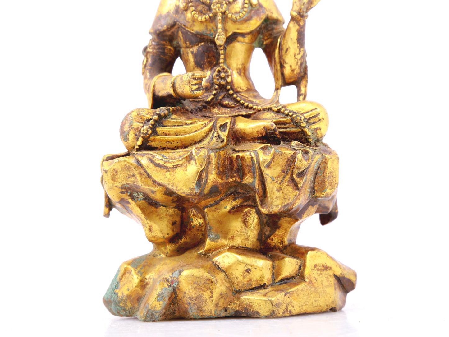 A sacred gilt bronze statue of Gautama Buddha