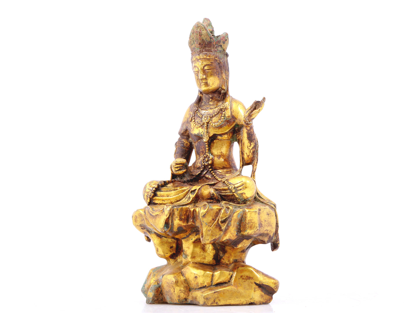 A sacred gilt bronze statue of Gautama Buddha