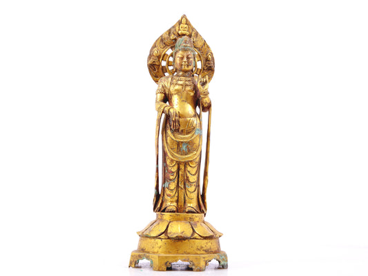 A sacred gilt bronze statue of Guanyin