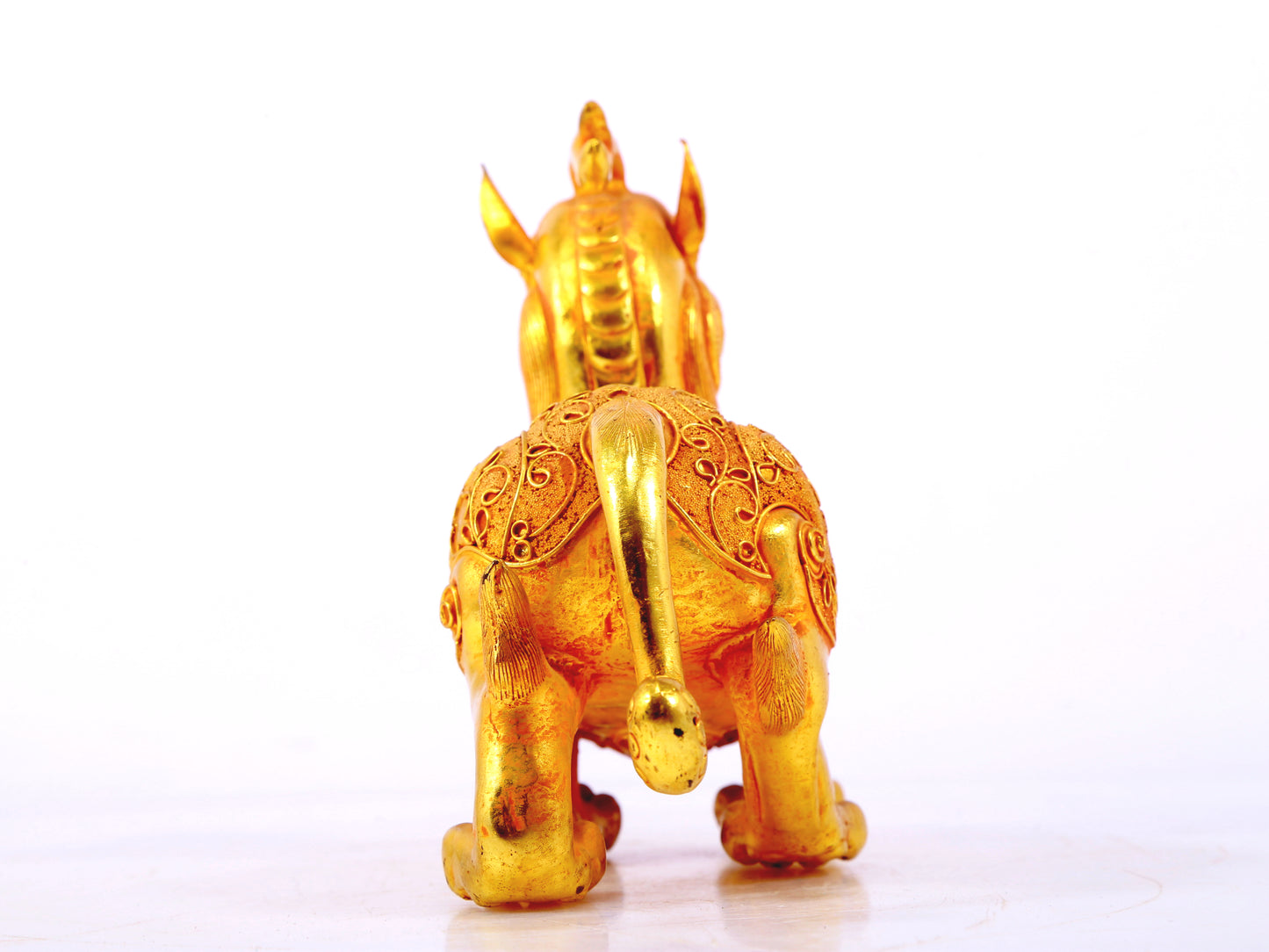 An exquisite gilt bronze auspicious animal ornament