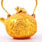 An exquisite gilt bronze figure holds a pot,