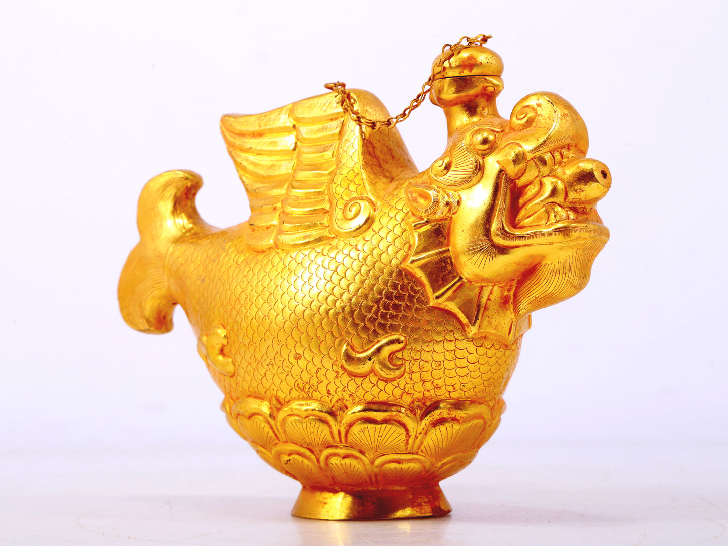 An exquisite gilt bronze vase with auspicious animal patterns,