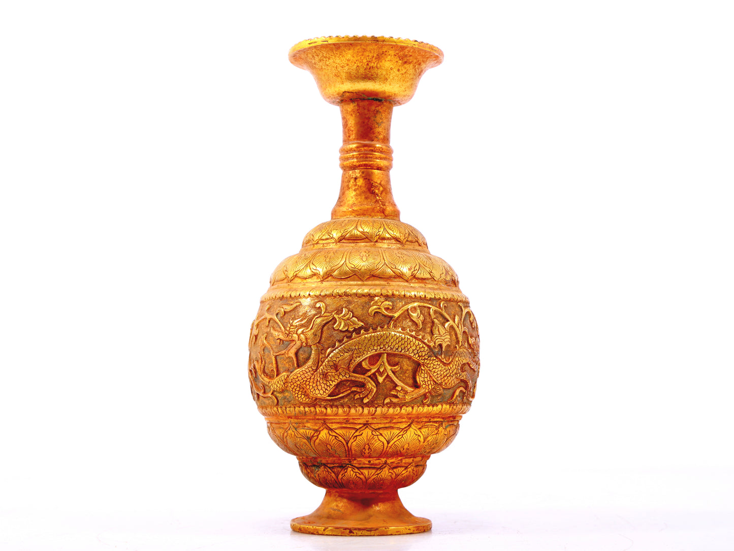 An exquisite gilt bronze vase with lotus and dragon patterns wrapped around branches.