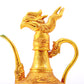 An exquisite gilt bronze ewer with dragon and phoenix patterns