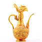 An exquisite gilt bronze ewer with dragon and phoenix patterns