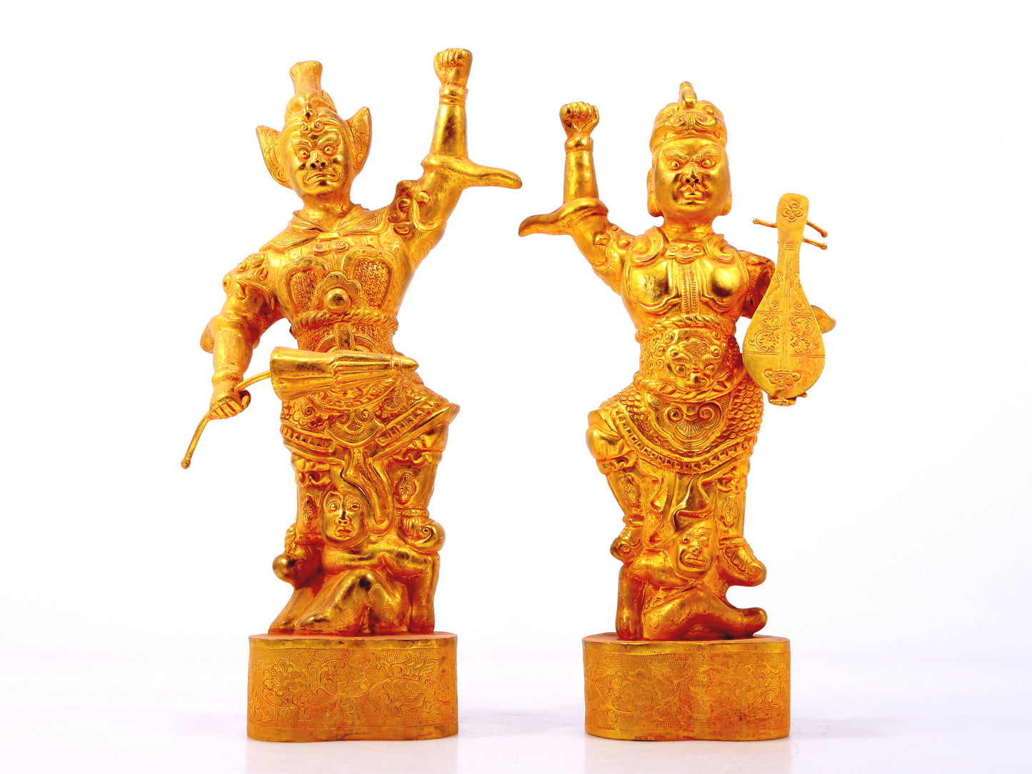 A group of solemn gilt bronze statues of the Heavenly King