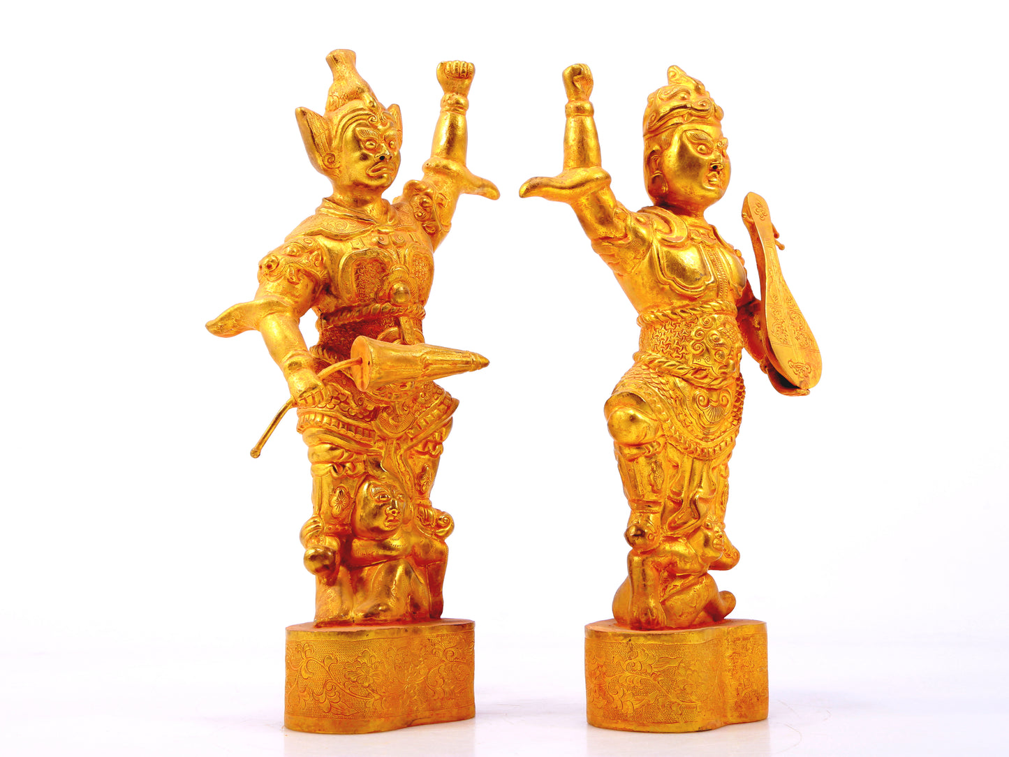 A group of solemn gilt bronze statues of the Heavenly King