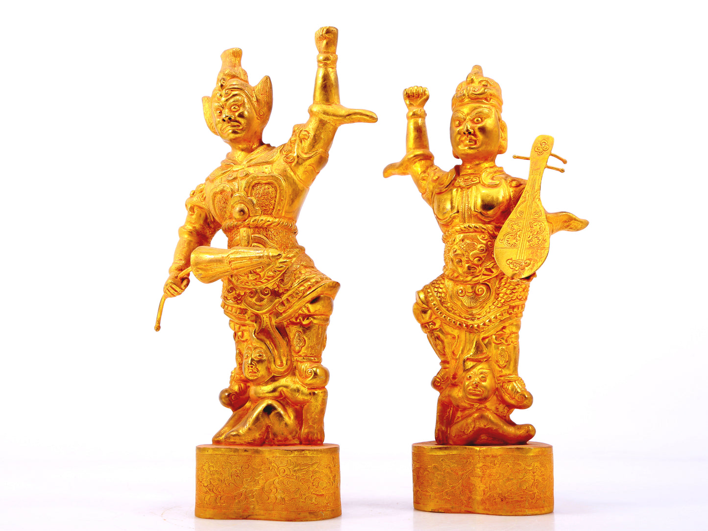 A group of solemn gilt bronze statues of the Heavenly King