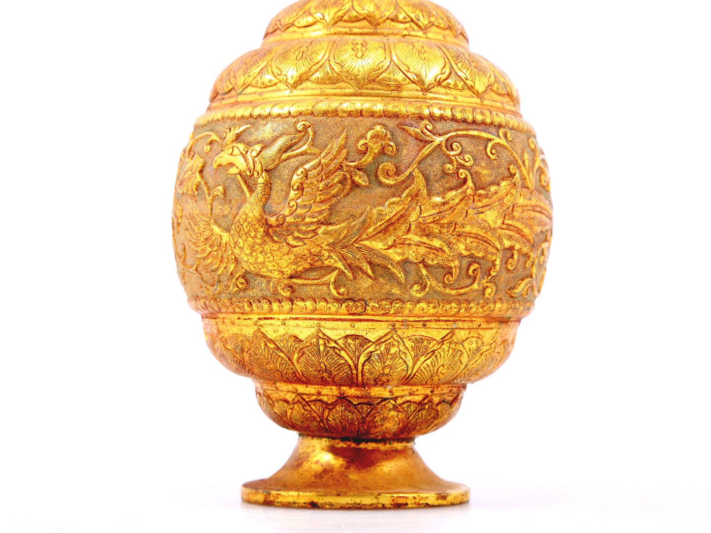 An exquisite gilt bronze vase with lotus and phoenix patterns wrapped around branches