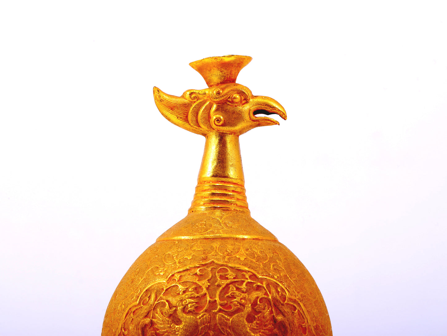 An exquisite gilt bronze vase with lotus and auspicious animal patterns