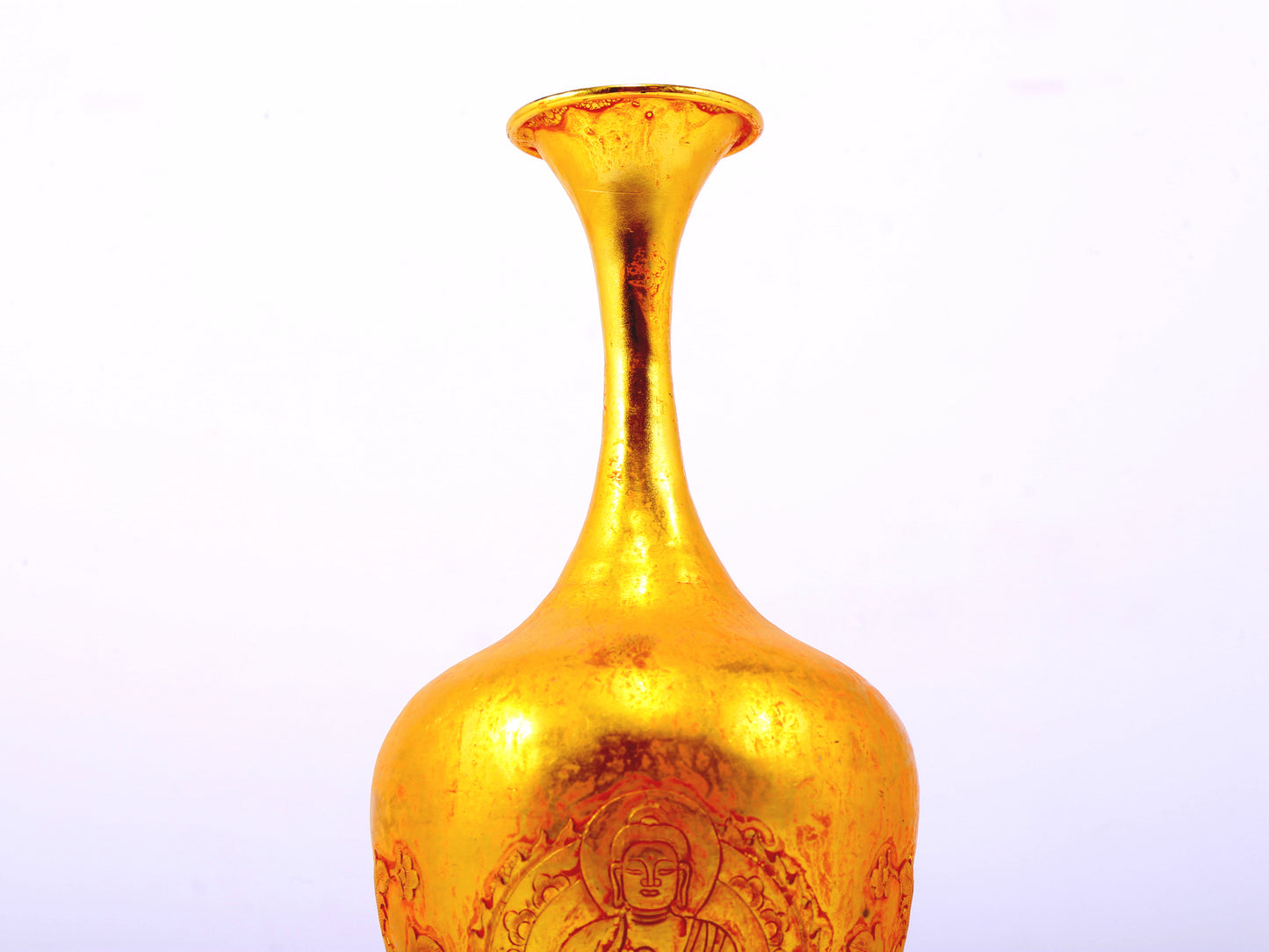 An exquisite gilt bronze vase with image of Gautama Buddha