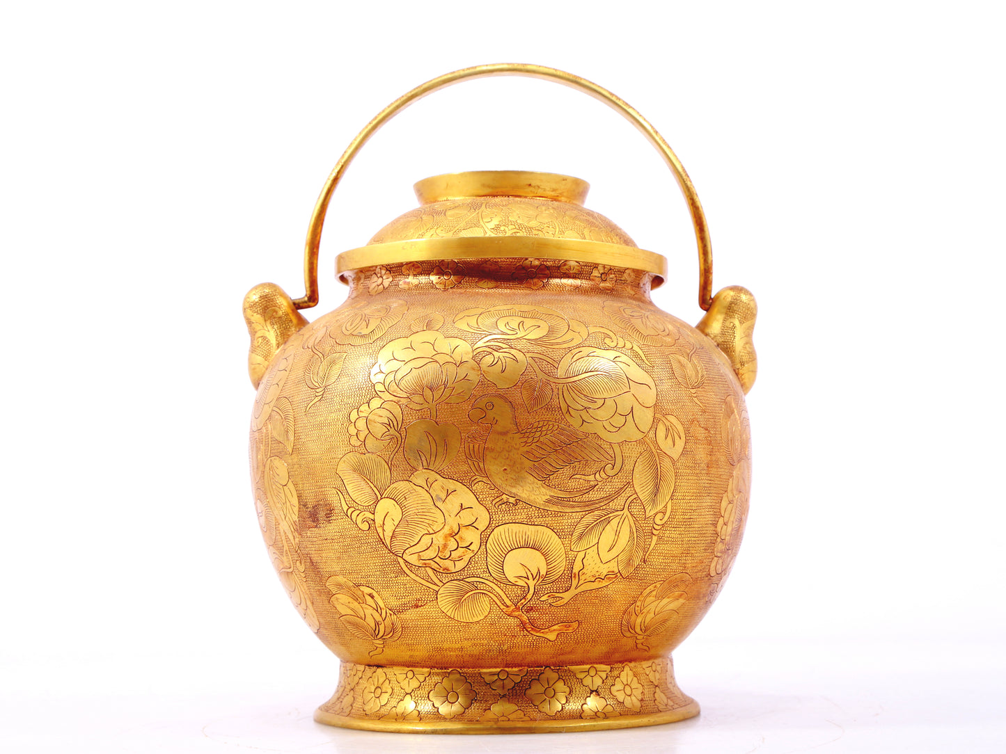 An exquisite gilt bronze jar with flower and bird patterns and lid