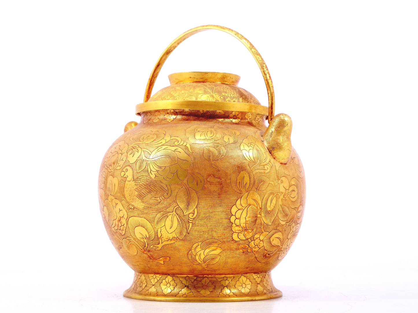 An exquisite gilt bronze jar with flower and bird patterns and lid