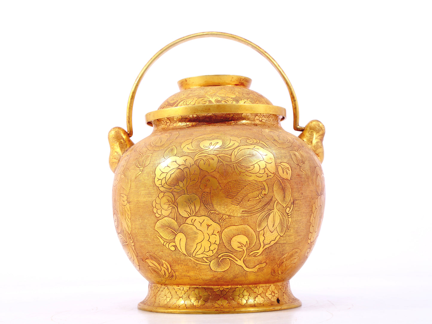 An exquisite gilt bronze jar with flower and bird patterns and lid