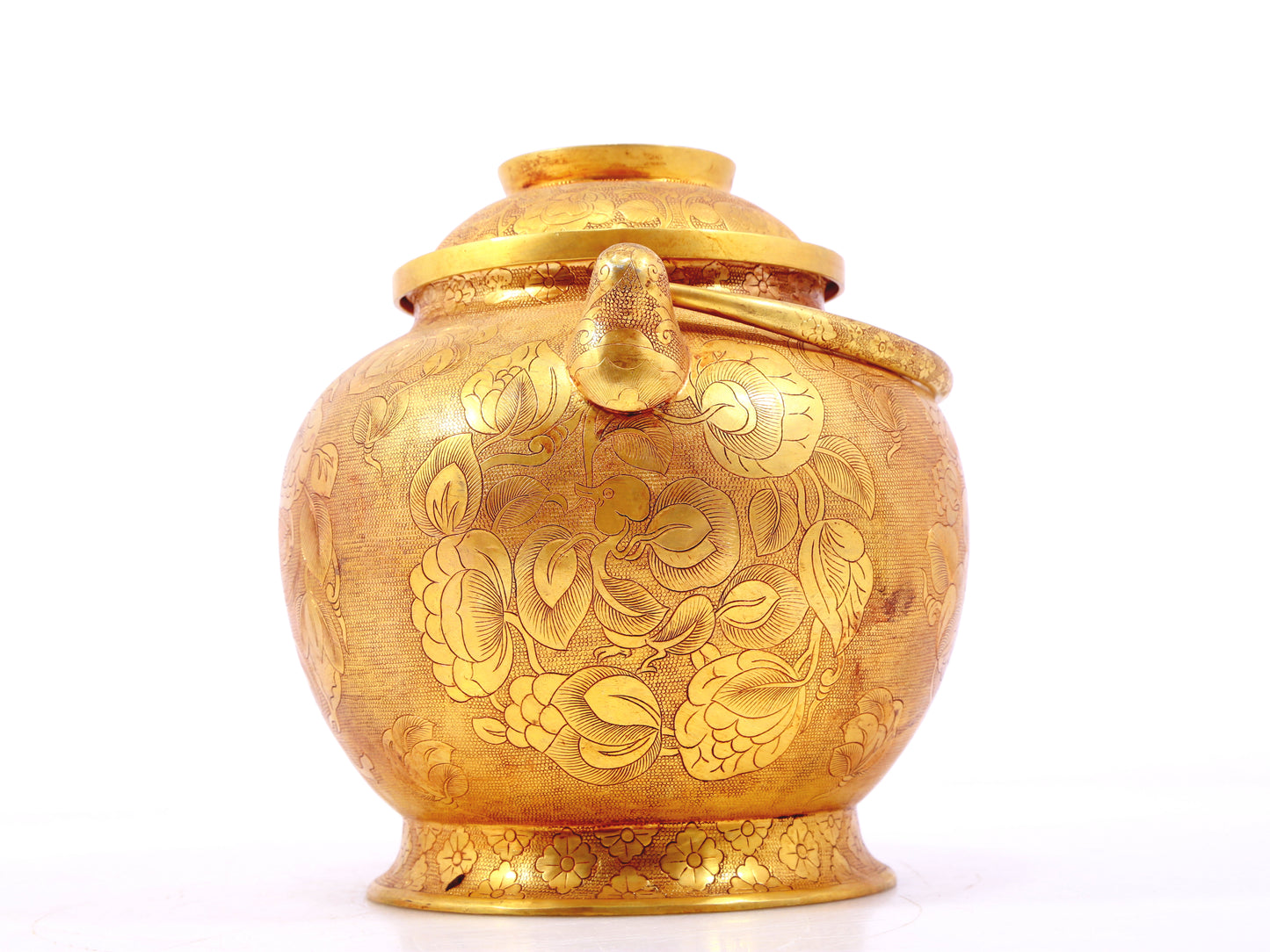 An exquisite gilt bronze jar with flower and bird patterns and lid