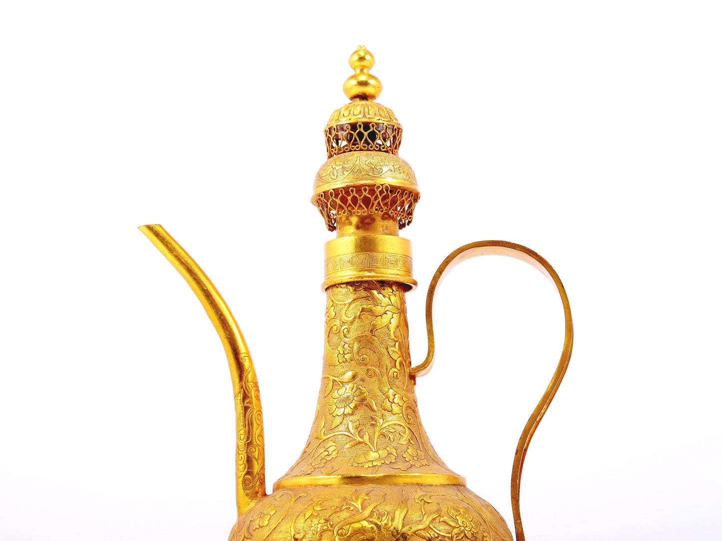 An exquisite gilt bronze ewer with lotus and phoenix patterns wrapped around branches