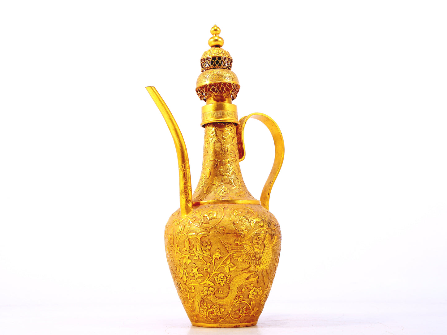 An exquisite gilt bronze ewer with lotus and phoenix patterns wrapped around branches