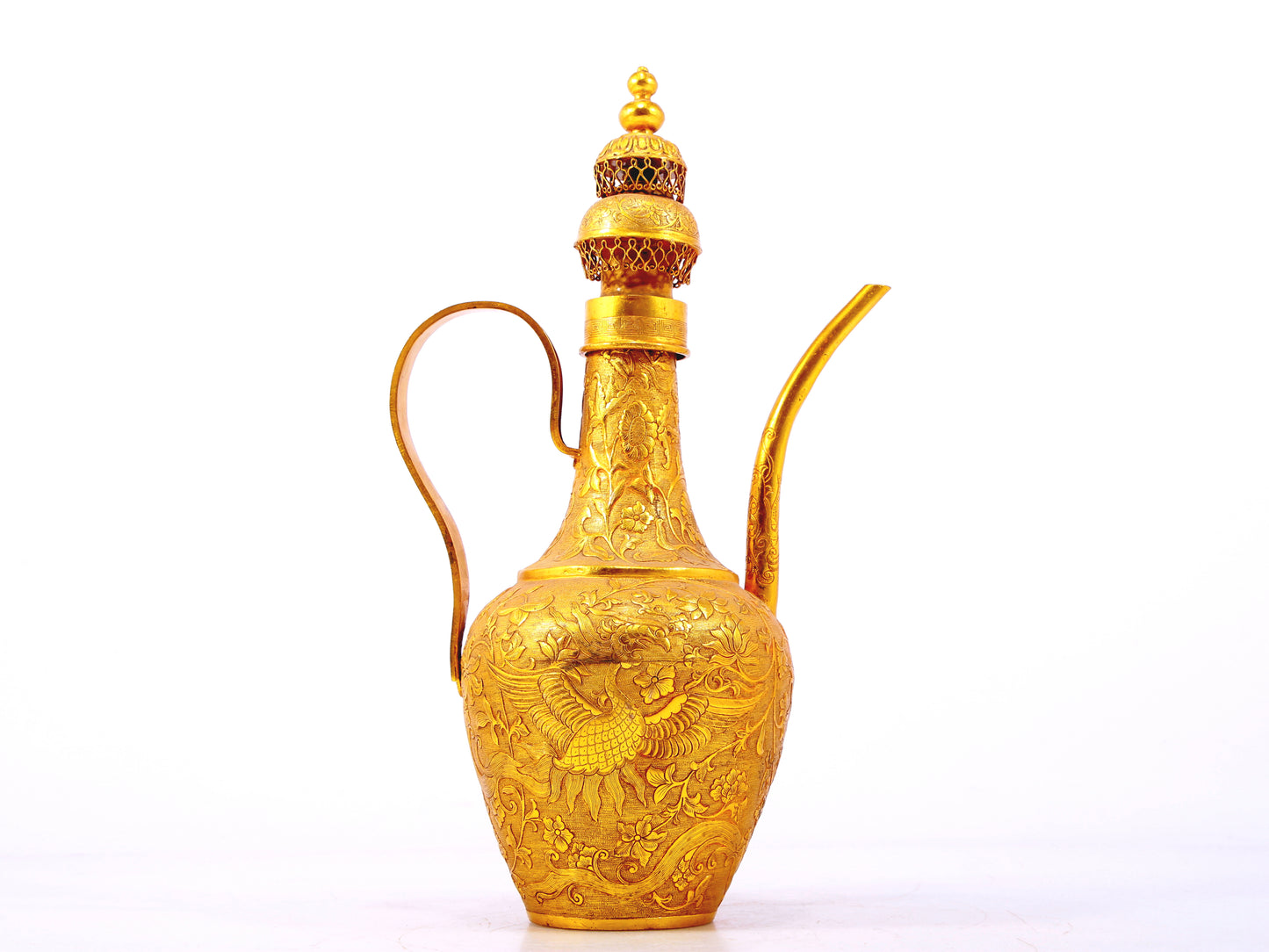 An exquisite gilt bronze ewer with lotus and phoenix patterns wrapped around branches