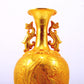 An exquisite gilt bronze amphorae with auspicious clouds and phoenix patterns