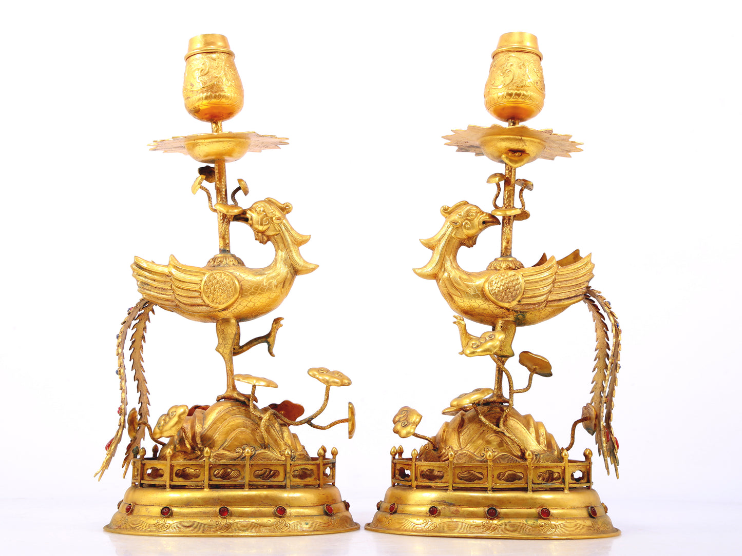 A pair of exquisite gilt bronze phoenix candlesticks