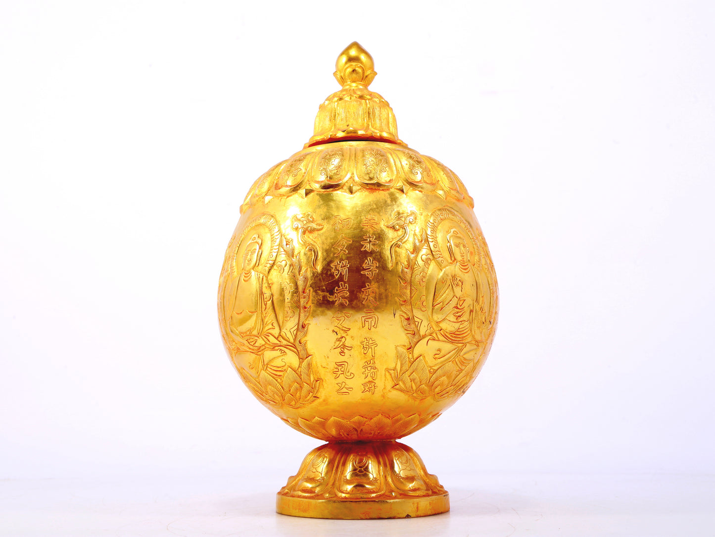 An exquisite gilt bronze jar with image of Gautama Buddha