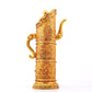 An exquisite gilt bronze ewer inlaid with a multi-twined lotus and eight talisman patterns.