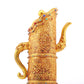 An exquisite gilt bronze ewer inlaid with a multi-twined lotus and eight talisman patterns.