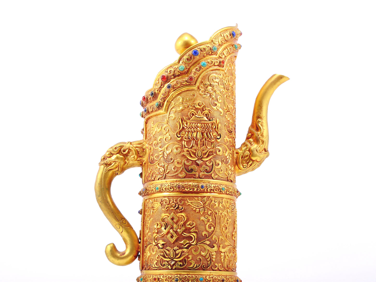 An exquisite gilt bronze ewer inlaid with a multi-twined lotus and eight talisman patterns.