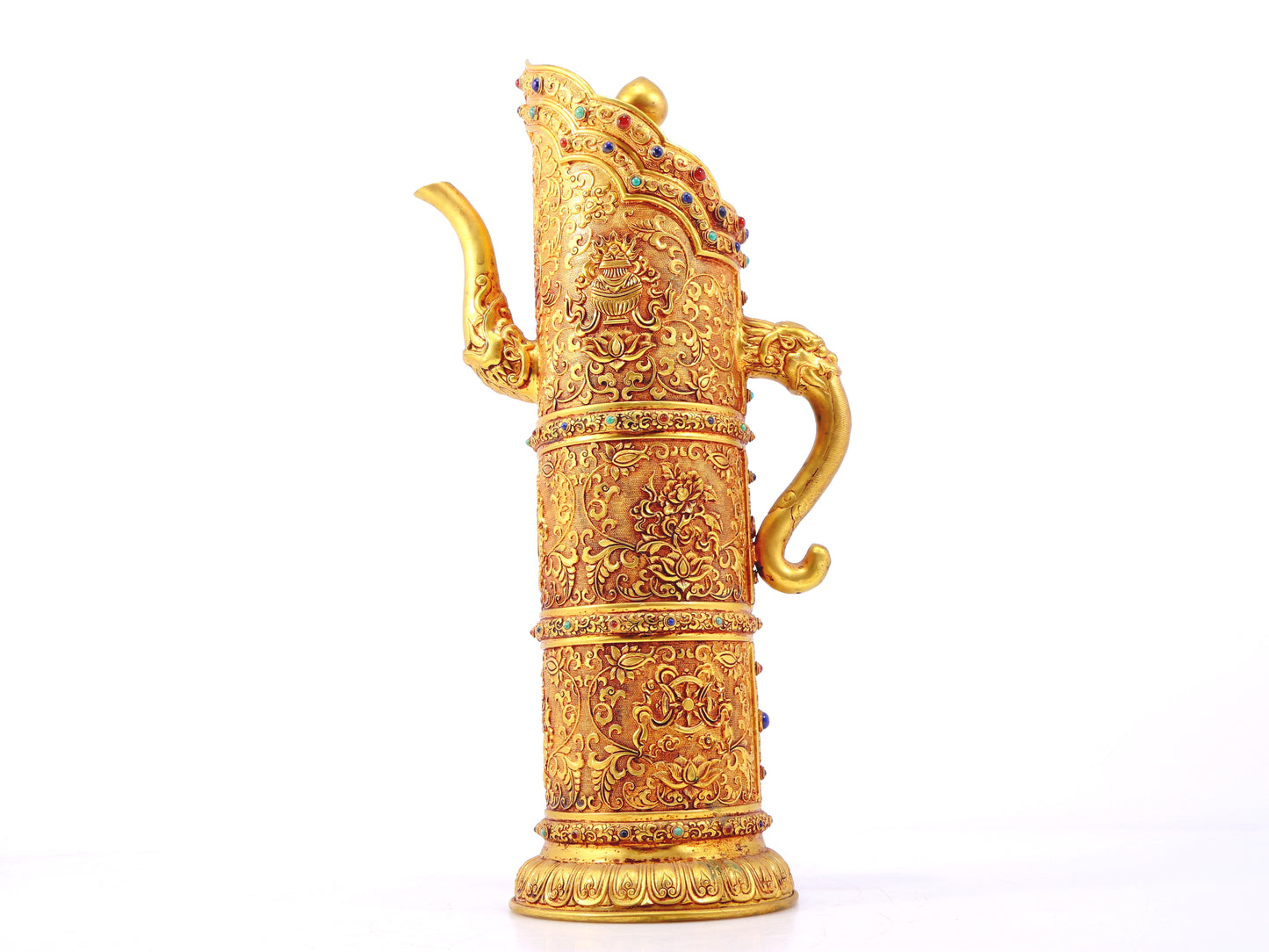 An exquisite gilt bronze ewer inlaid with a multi-twined lotus and eight talisman patterns.