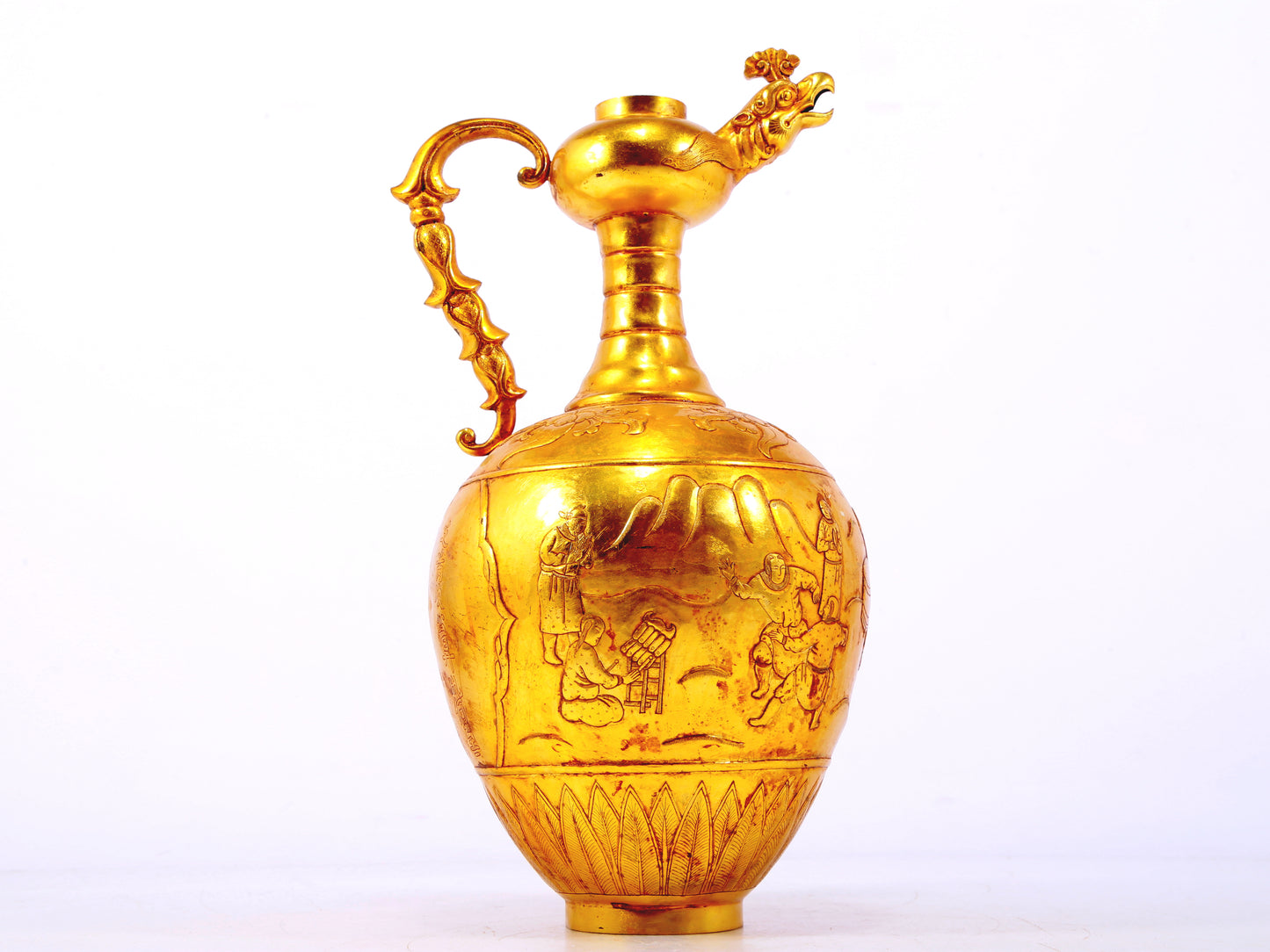 An exquisite gilt bronze landscape figure holding a pot