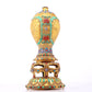 An exquisite gilt bronze vase inlaid with hundreds of treasures, auspicious clouds and dragon patterns