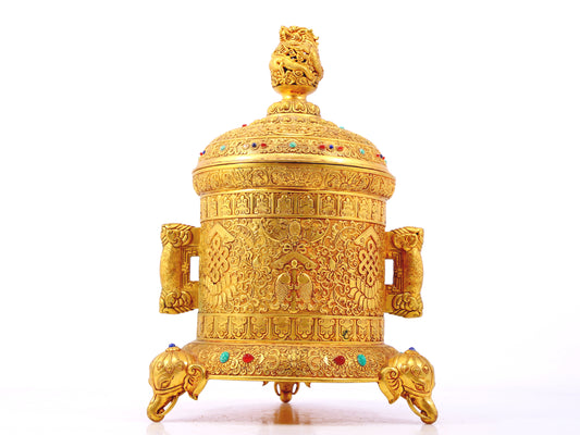 An exquisite gilt bronze double-eared tripod jar with a lid inlaid with hundreds of treasures and entwined lotus patterns.