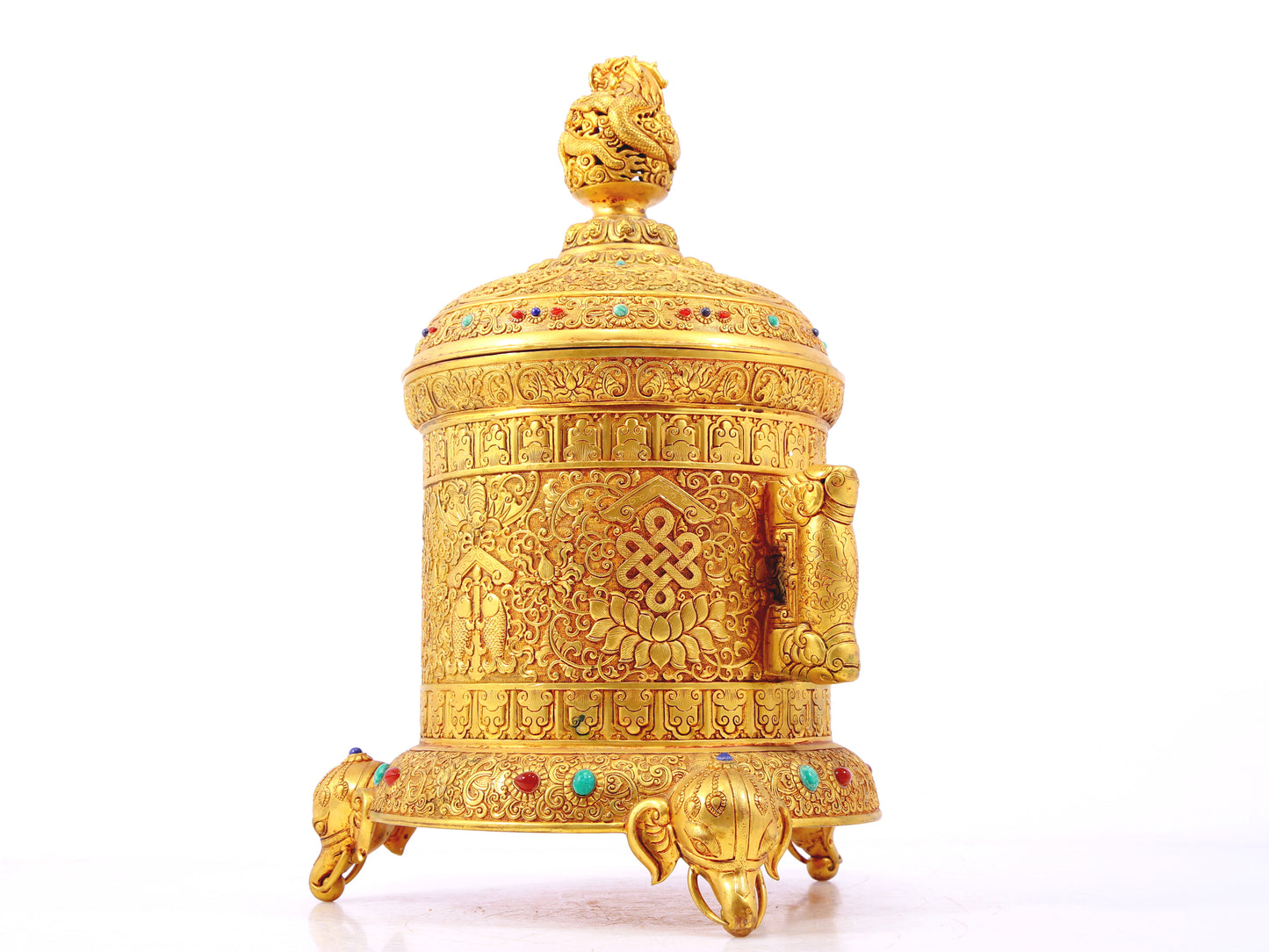 An exquisite gilt bronze double-eared tripod jar with a lid inlaid with hundreds of treasures and entwined lotus patterns.