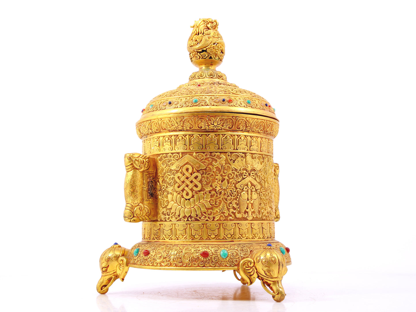 An exquisite gilt bronze double-eared tripod jar with a lid inlaid with hundreds of treasures and entwined lotus patterns.