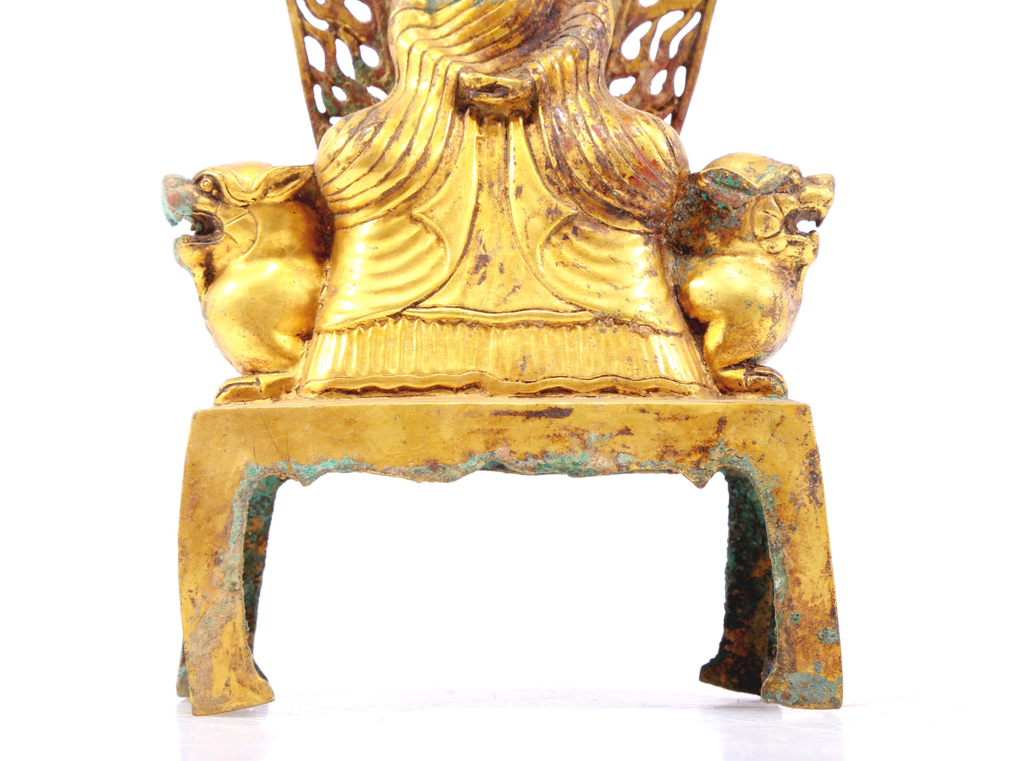 A serene gilt bronze statue of Gautama Buddha