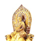 A serene gilt bronze statue of Gautama Buddha