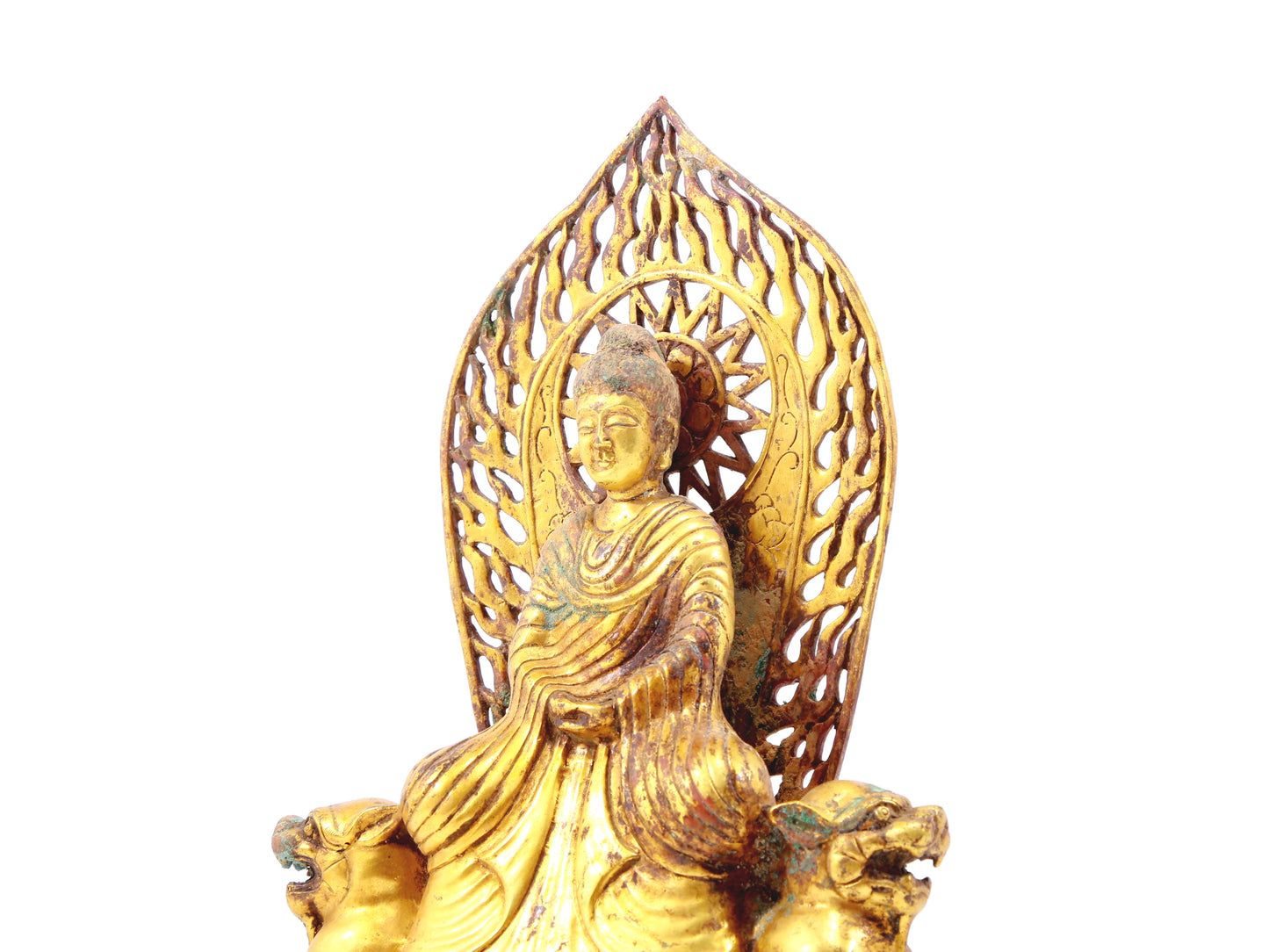 A serene gilt bronze statue of Gautama Buddha