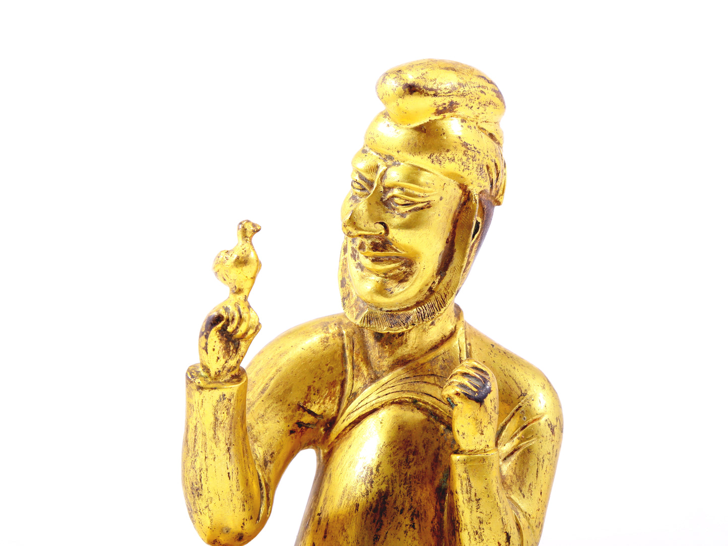 A serene gilt bronze figure